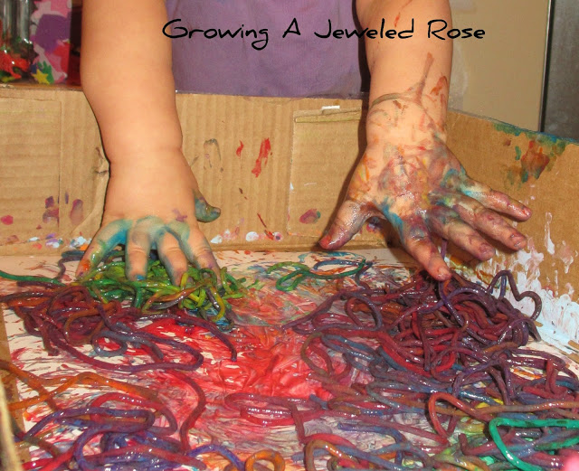 100 Things You Can Buy From the Dollar Tree and Use in Play - Perfect Nanny Match - spaghetti_painting_with_your_hands